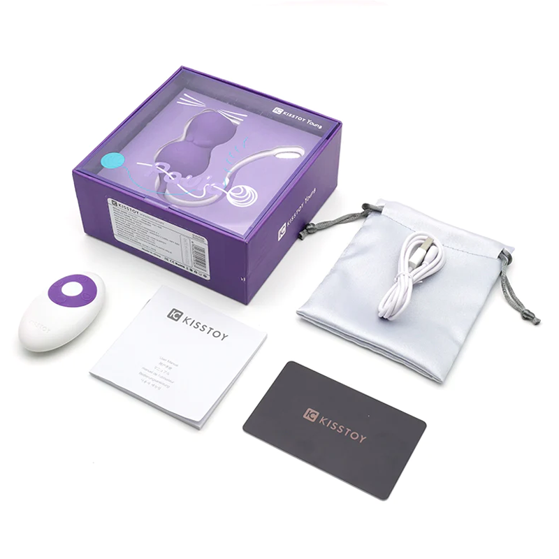 A purple kitty-shaped vibrator with a remote, charging cable, and instruction booklet.