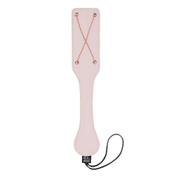 Faux leather paddle with rose gold chains and wrist loop.