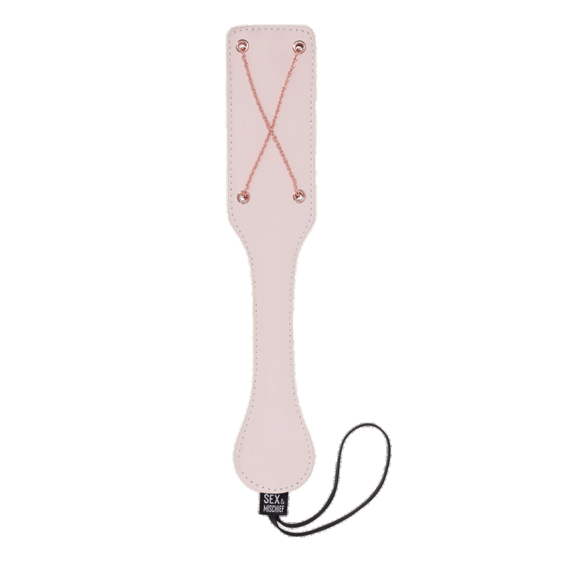 Faux leather paddle with rose gold chains and wrist loop.