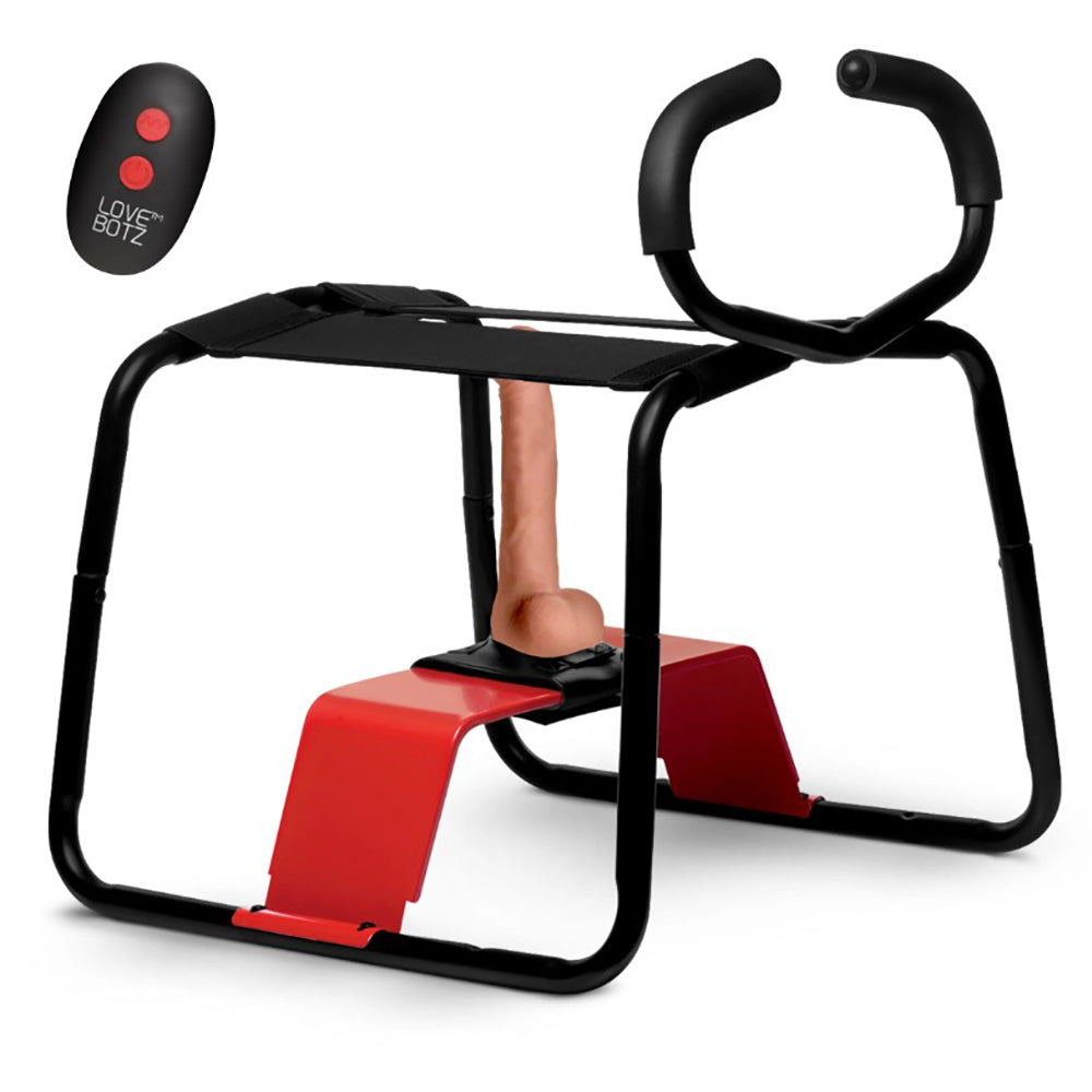 A black and red dildo bench with a remote control.