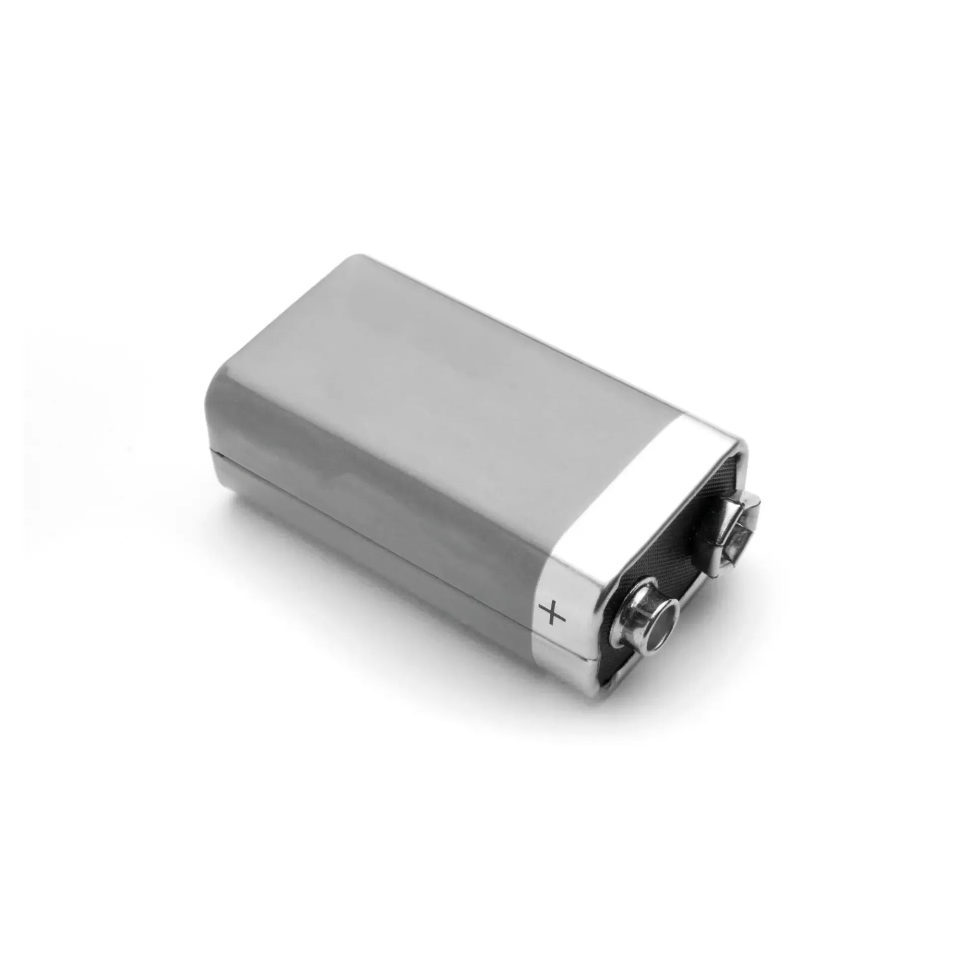 A silver 9V battery with a plus symbol on the side.