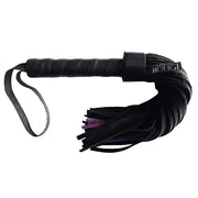 Black suede flogger with a leather handle and purple accents.