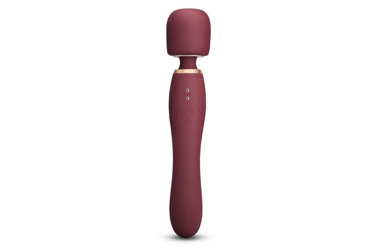 A maroon vibrating wand with a rounded head and a textured grip.