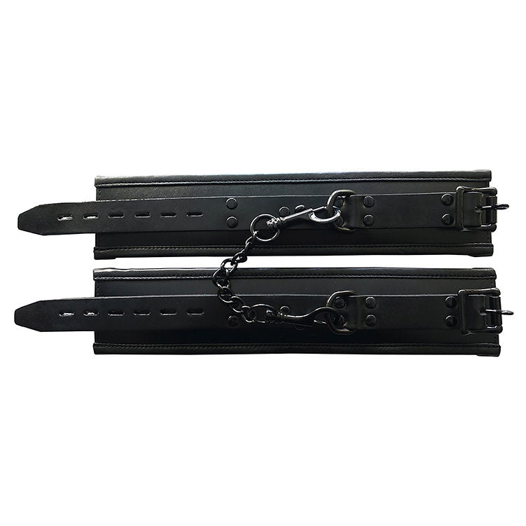 Black padded leather wrist cuffs with chain and lockable buckles.