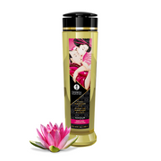 Shunga Amour Sweet Lotus massage oil bottle with a pink lotus flower.