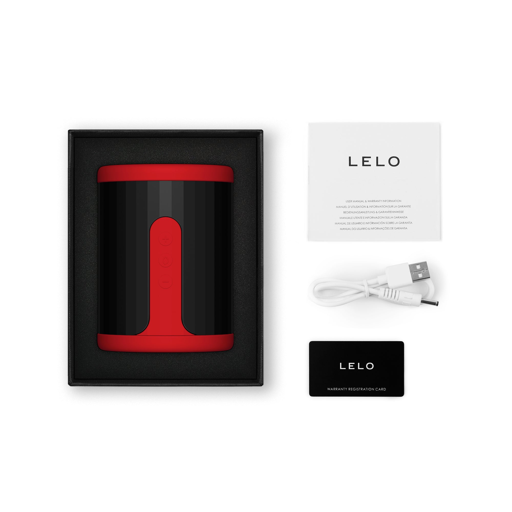 Red Lelo F2S app-controlled men's stroker with charging cable and manual.