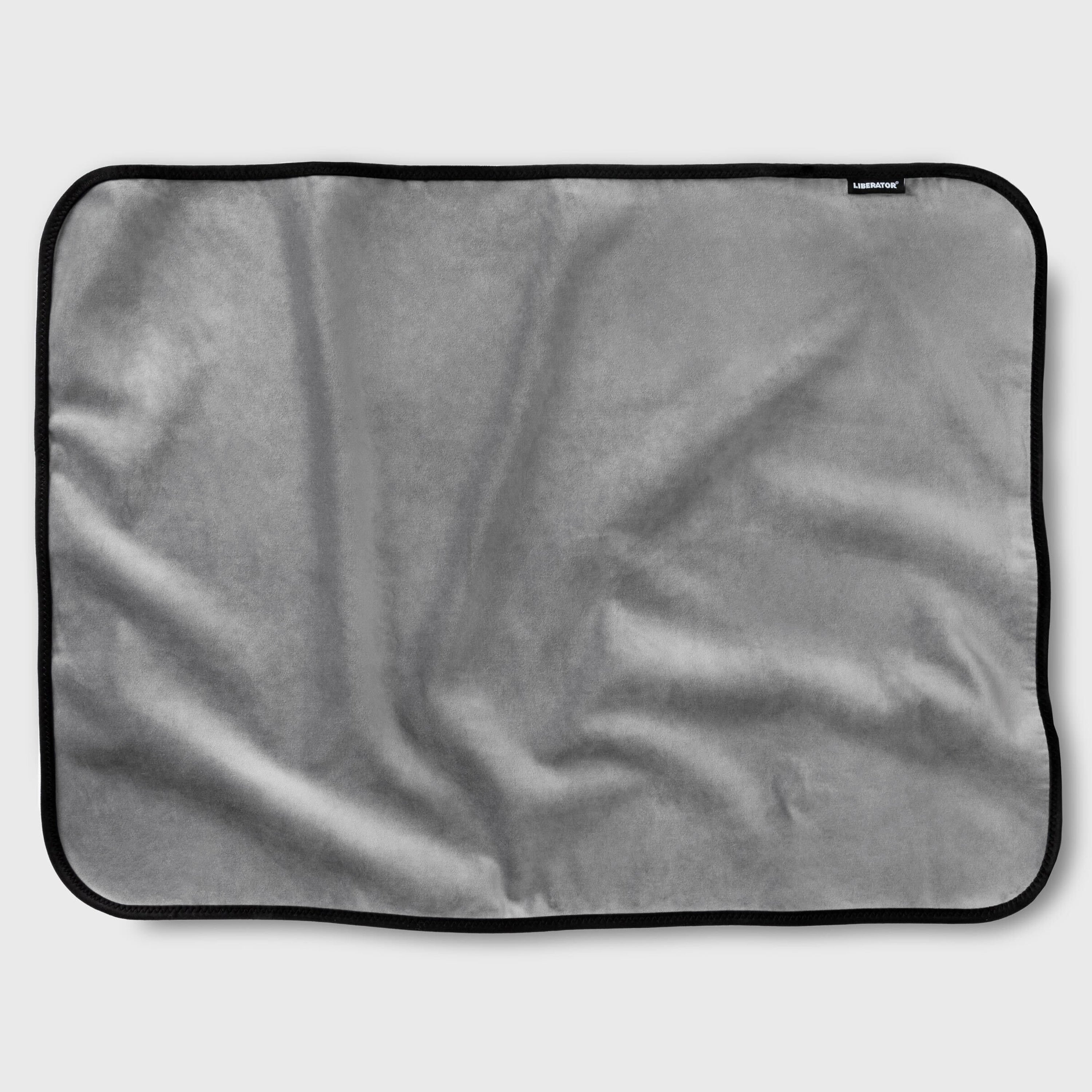 Grey microvelvet waterproof sex throw blanket with black trim.