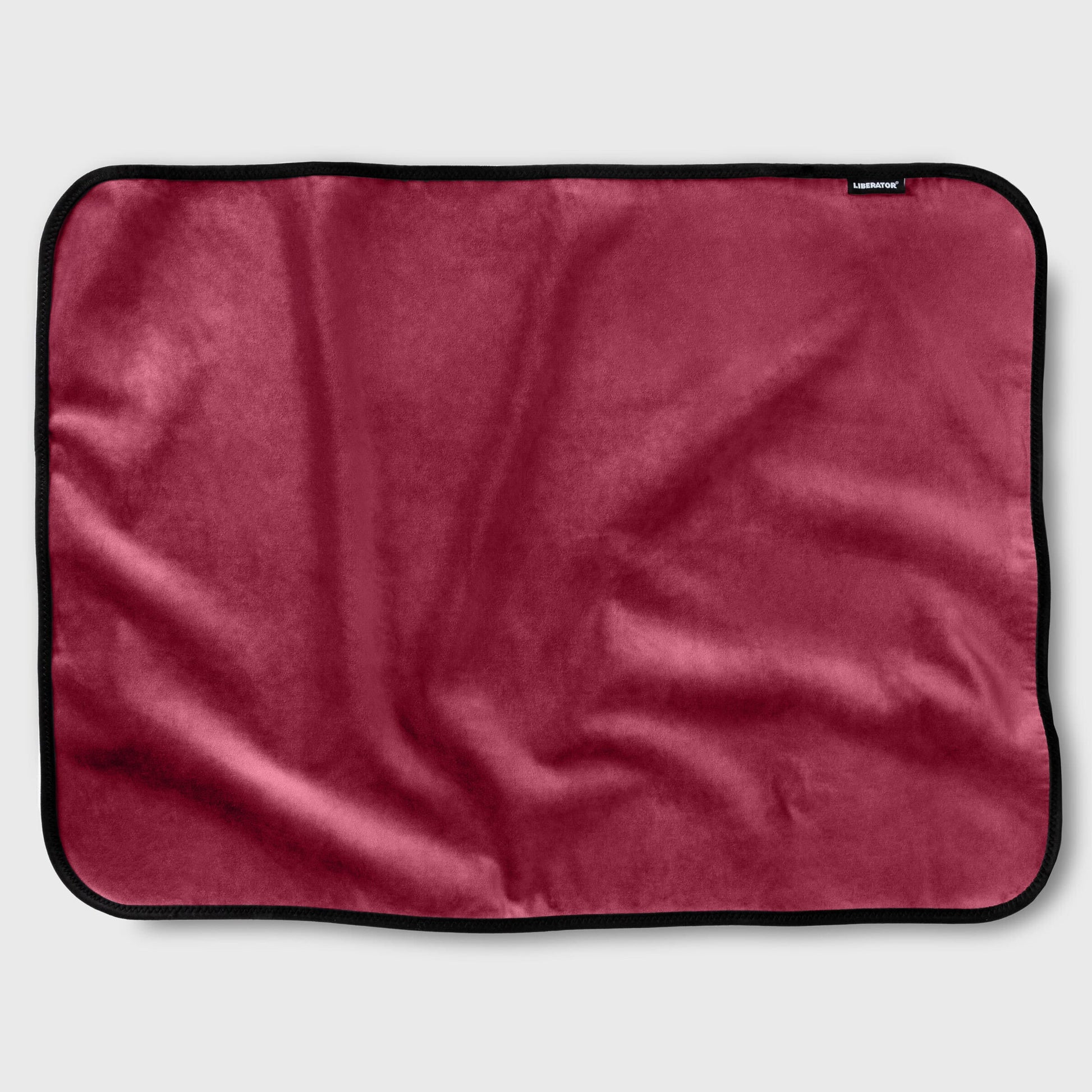 A mini merlot waterproof microvelvet sex throw with a black border.