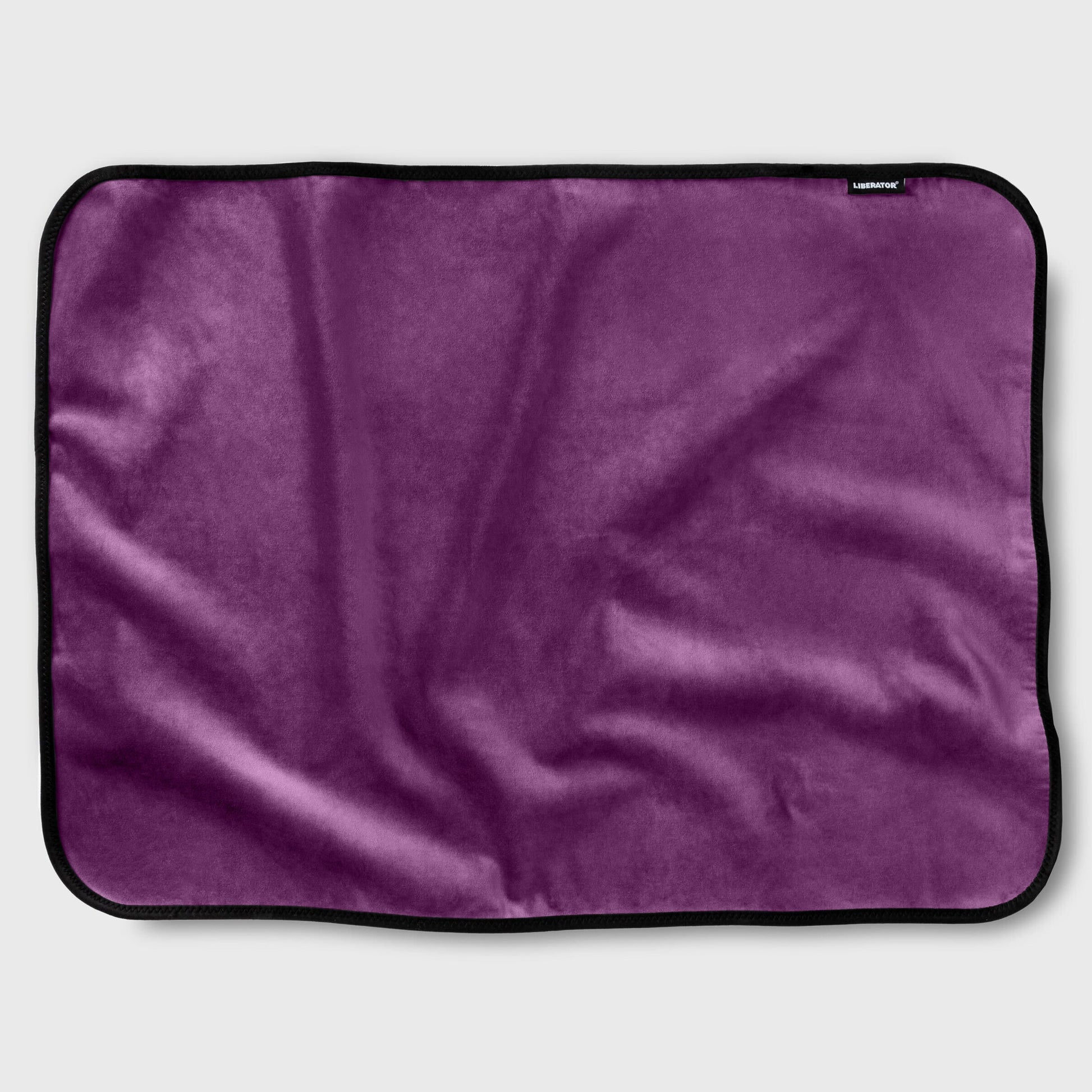 Aubergine microvelvet waterproof sex throw with black trim.