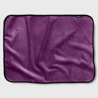 Aubergine microvelvet waterproof sex throw with black trim.