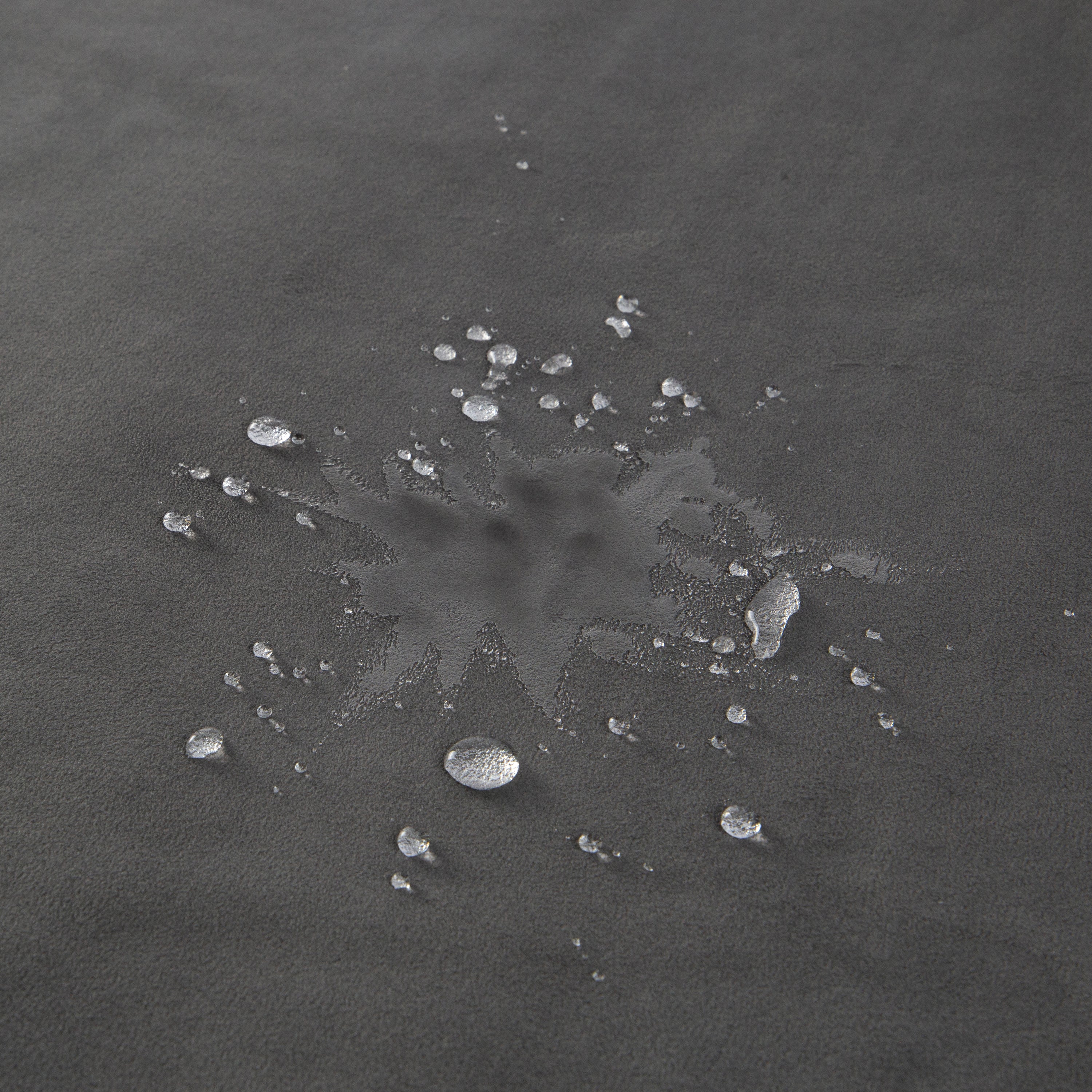 Grey waterproof microvelvet sex throw with water droplets.