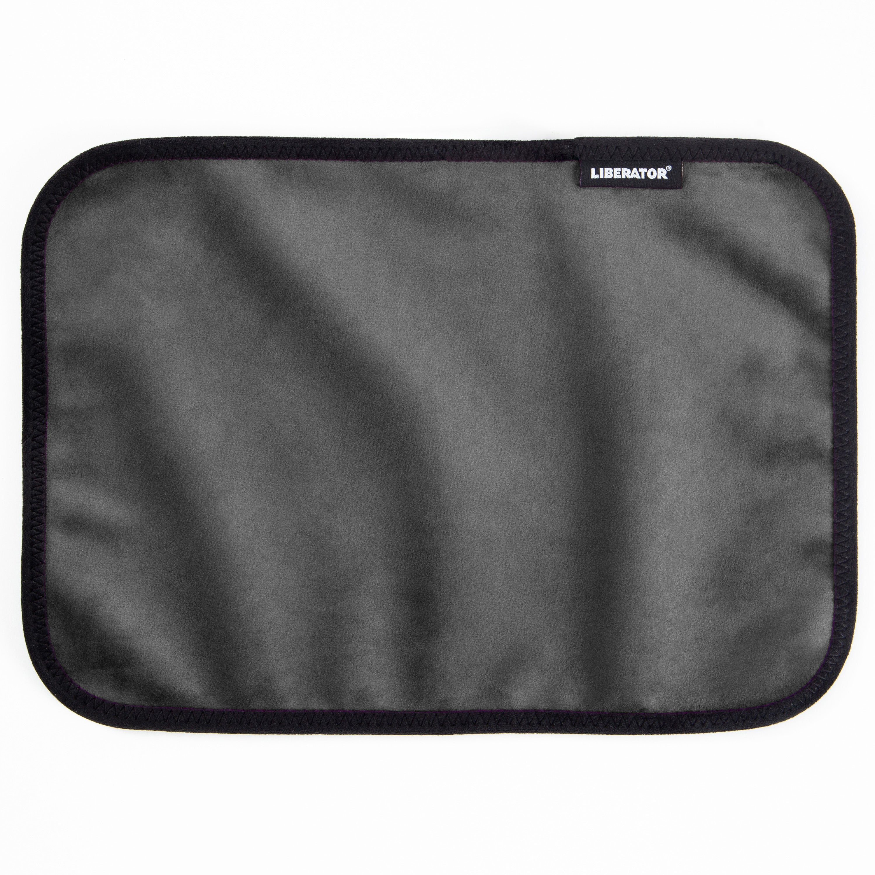 A gray moisture-proof toy pad with a black stitched border and the Liberator logo.