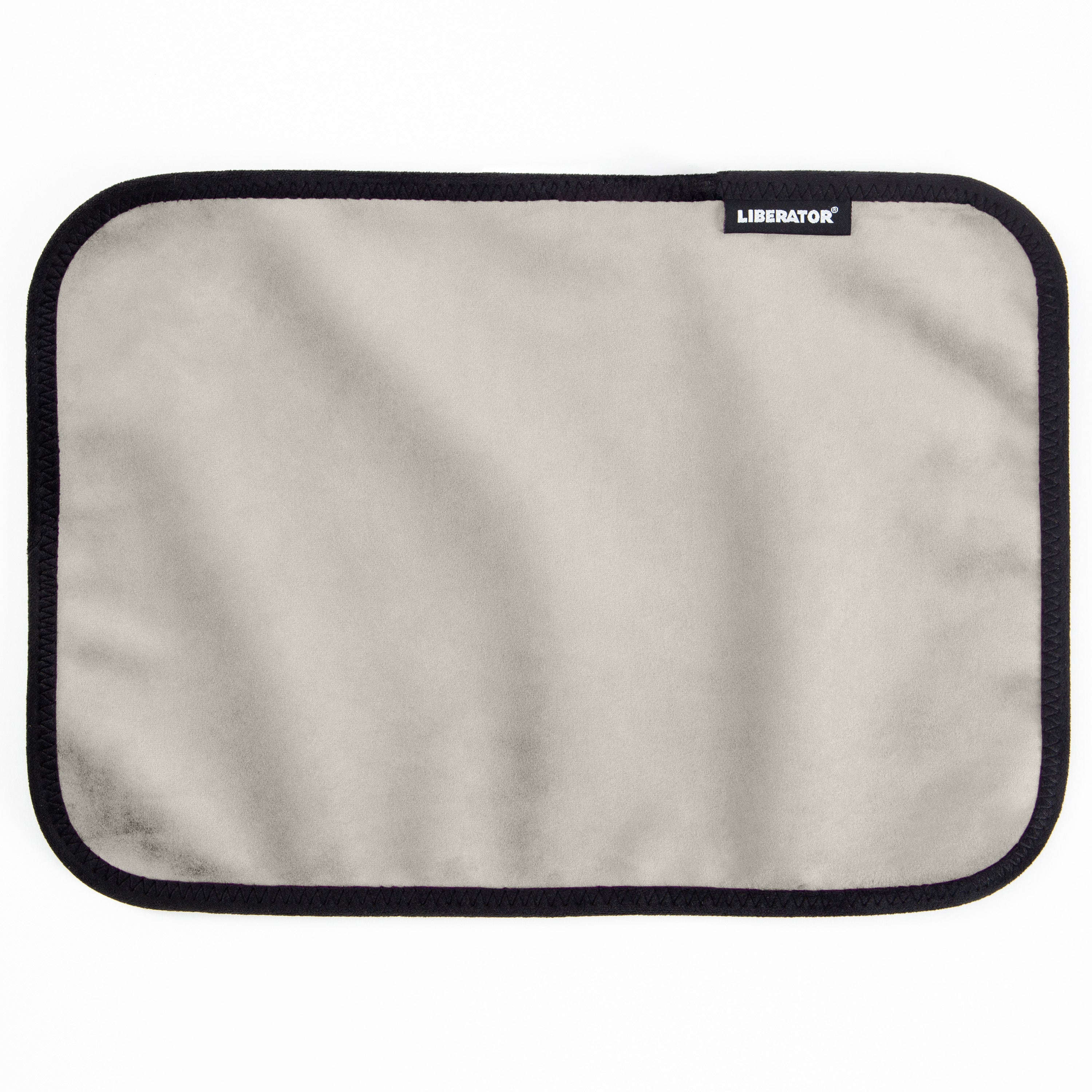 A rectangular grey microvelvet pad with a black stitched border and a Liberator logo.