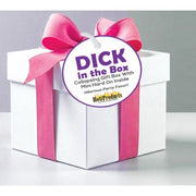 A white gift box with a pink ribbon and a tag that says "Dick in the Box".