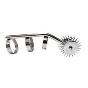 Stainless steel finger-worn toy with a spiked wheel and three rings.