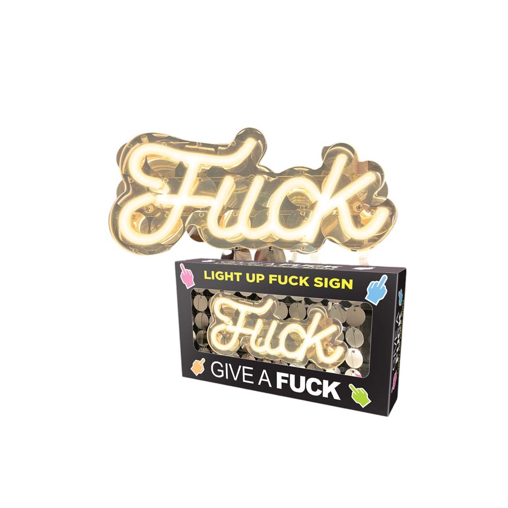 A gold neon "Fuck" sign with a sequin background.