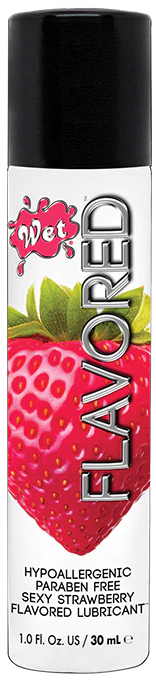 Wet Strawberry Flavored Lubricant bottle with a strawberry image.