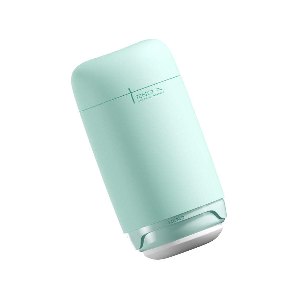 A light teal Tenga Puffy Soft Stroker with "Tenga" and "New Adult Concept" branding.