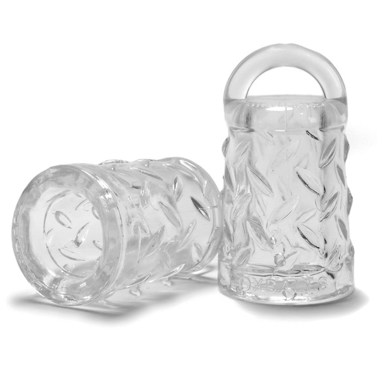 Clear FLEXtpr nipple suckers with textured grips and handles.