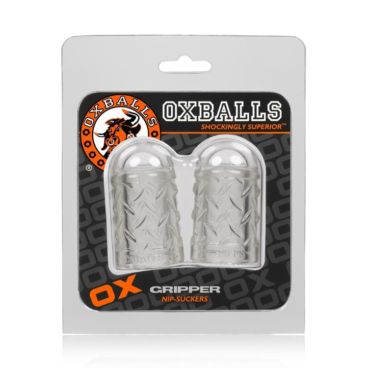 Clear Gripper Nipple Suckers by Oxballs with textured diamond pattern.