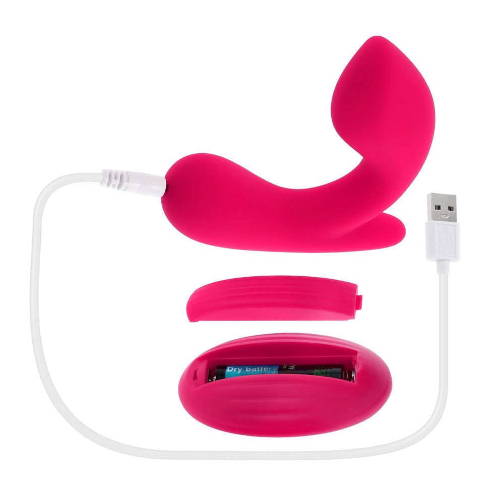 Pink vibrating prostate massager with USB charging cable and battery compartment.