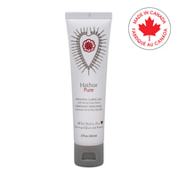 Hathor Pure personal lubricant in a white tube with a red heart design and a "Made in Canada" emblem.