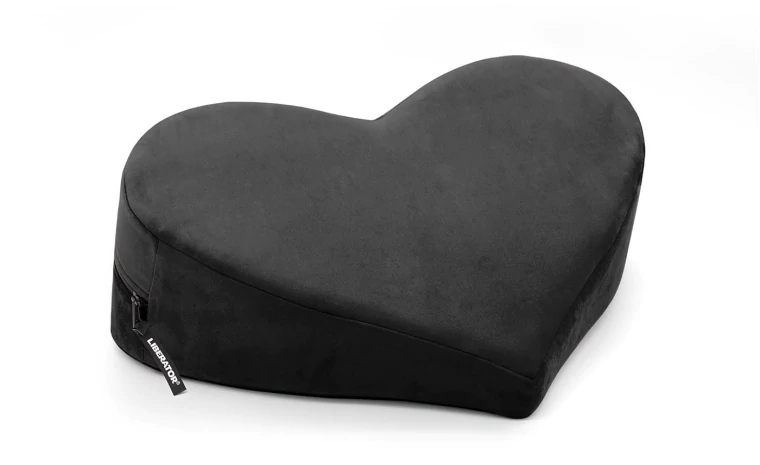 Black heart-shaped wedge positioning pillow with microvelvet cover.