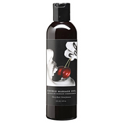 Edible Cherry Hemp Seed Massage Oil bottle with a label featuring cherries and lips.