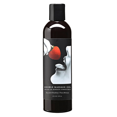 Bottle of strawberry edible massage oil with a black cap and label.
