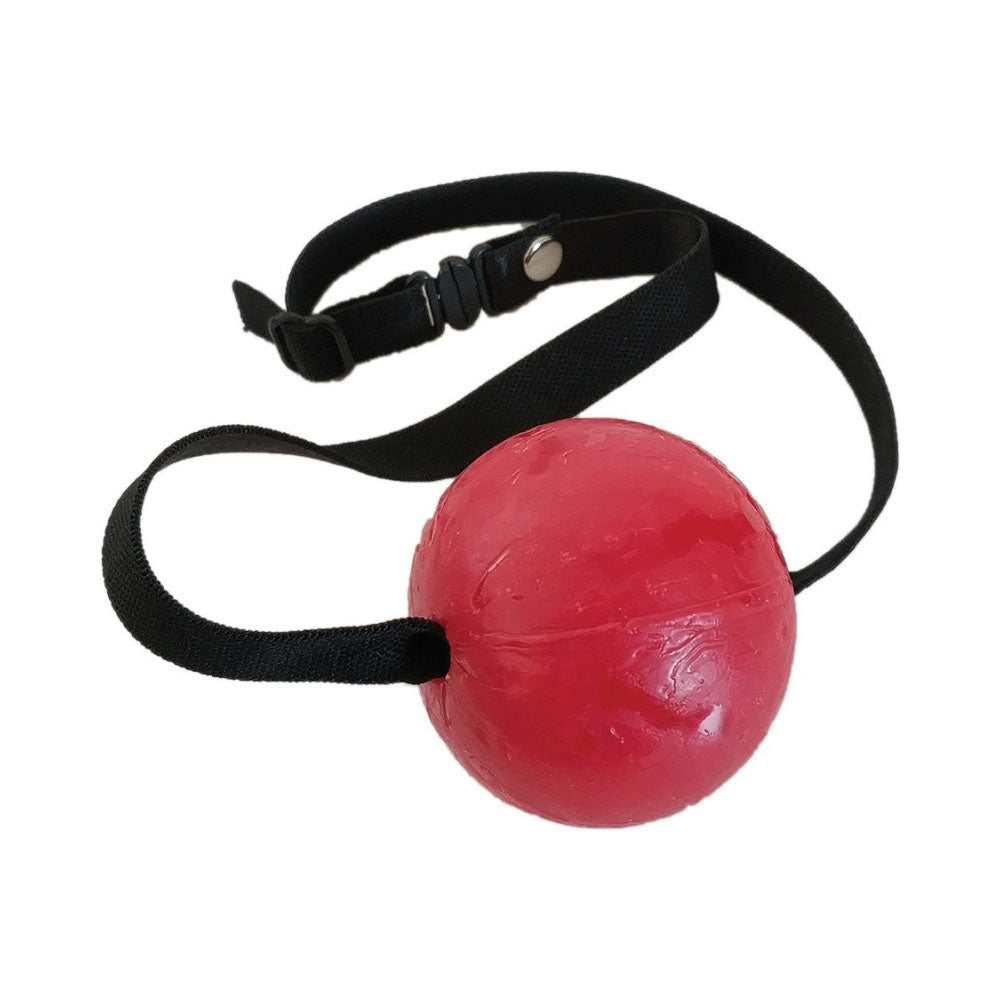 Red strawberry flavored candy ball gag with black adjustable strap.