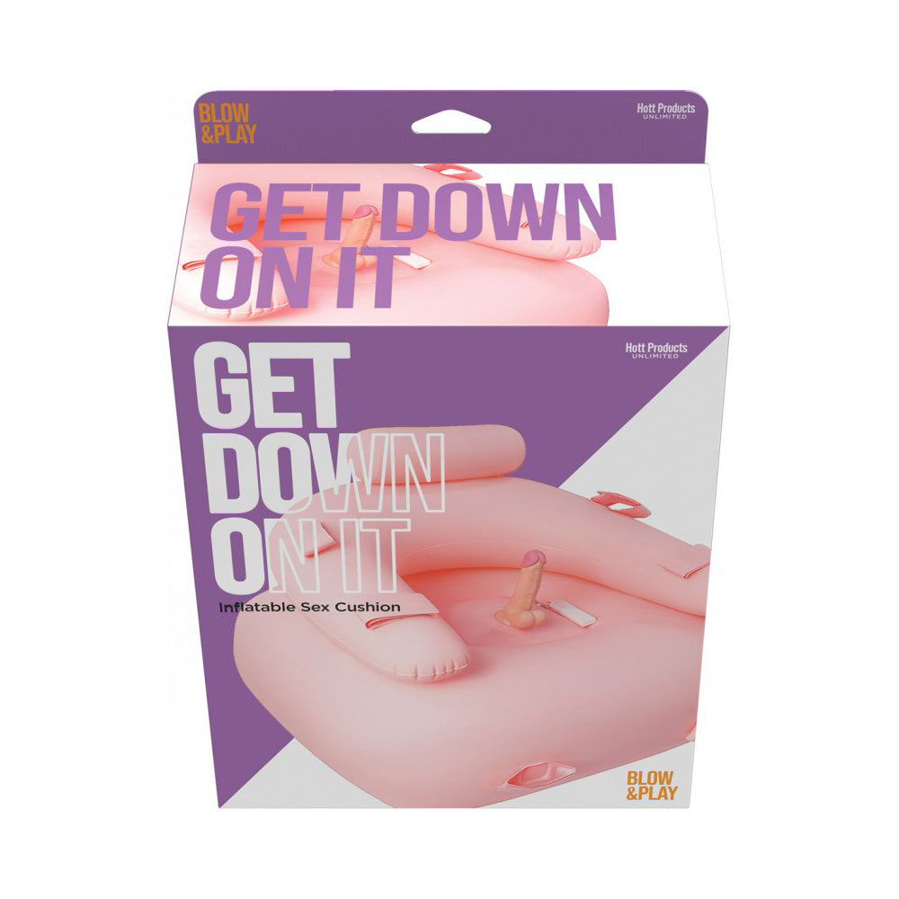 Pink inflatable sex cushion with a dildo and text that says "GET DOWN ON IT".