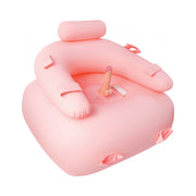 Pink inflatable seat with a removable vibrating dildo.