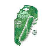 A green pickle-shaped vibrator in its packaging.