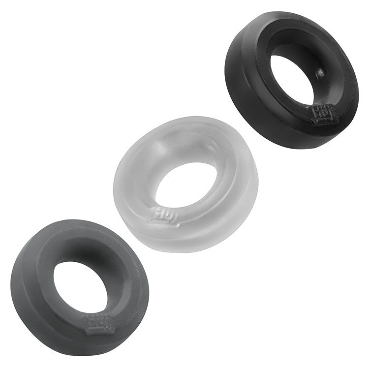 Three stretchy silicone cock rings in black, clear, and gray.