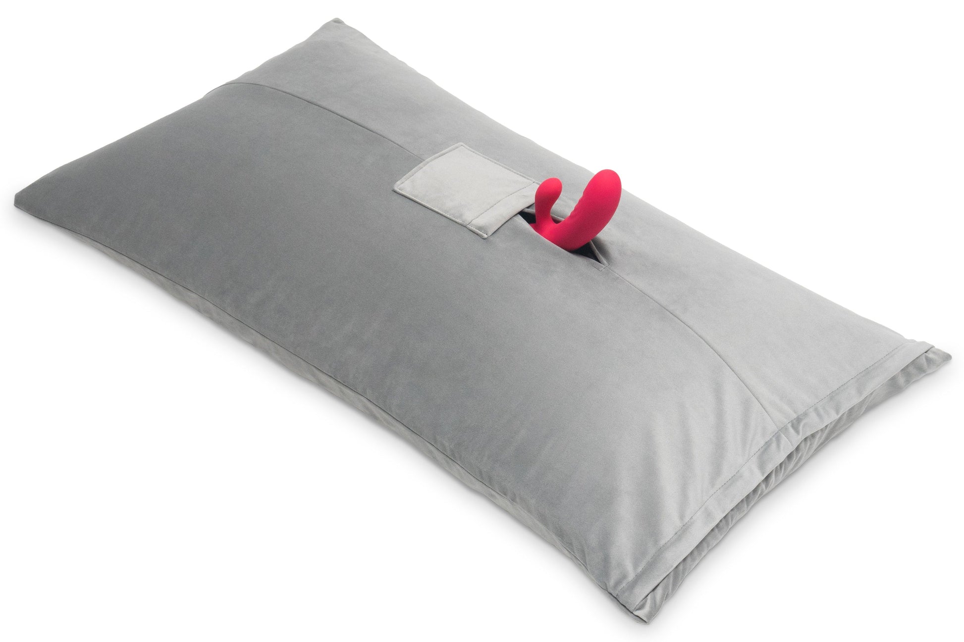 Grey microvelvet mount pillow with a pink toy peeking out of a pocket.