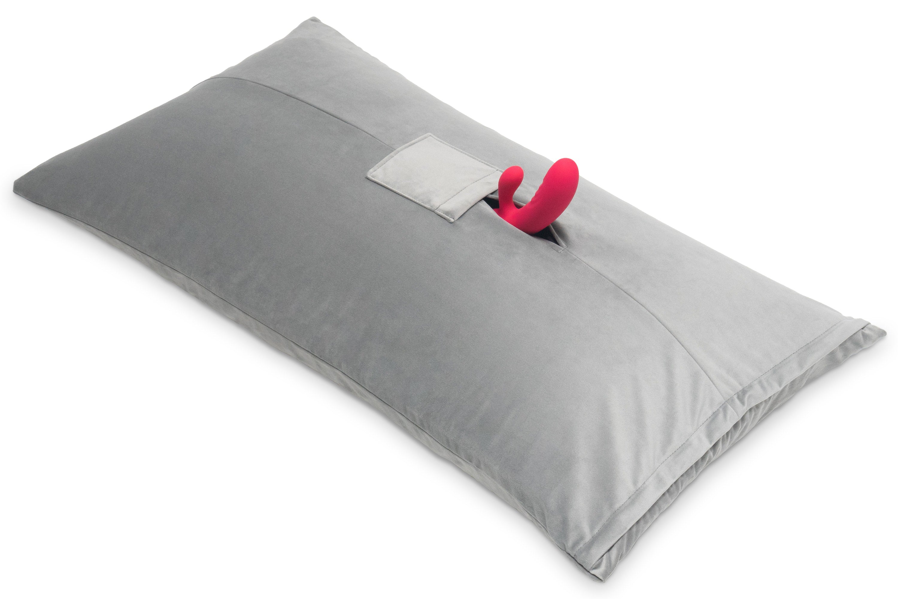 Grey microvelvet mount pillow with a pink toy peeking out of a pocket.