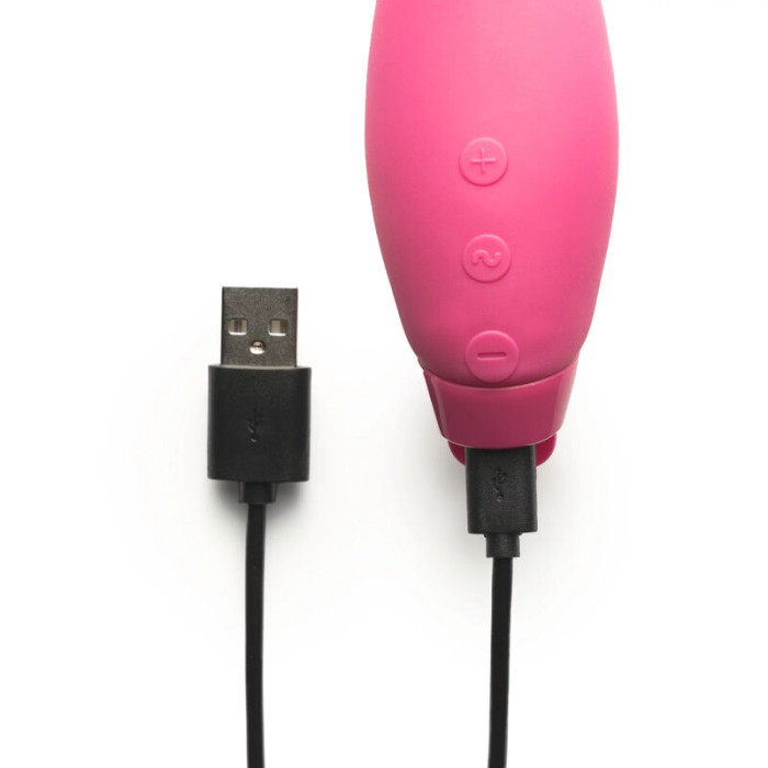 Fuchsia Juno vibrator with USB charging cable.