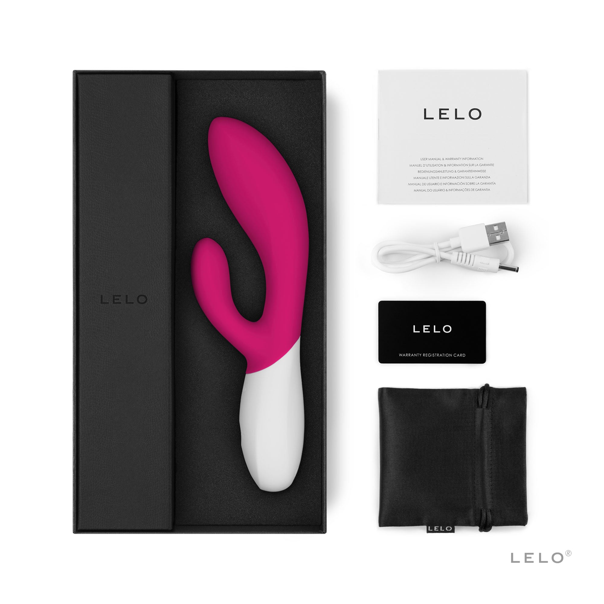A pink and white Lelo Ina Wave 2 rabbit vibrator with accessories.