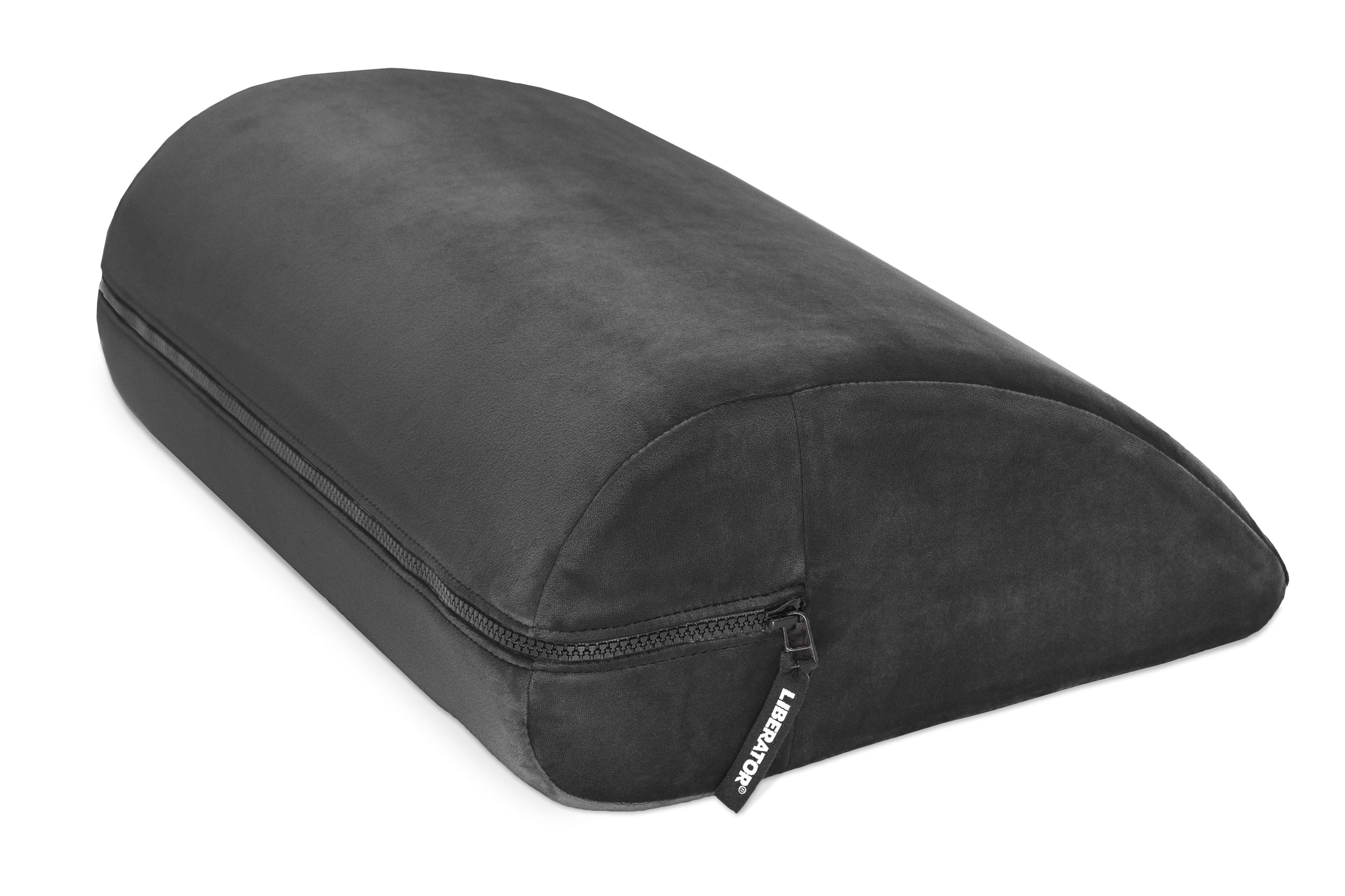 A black microvelvet wedge-shaped sex pillow with a zipper and a "Liberator" tag.