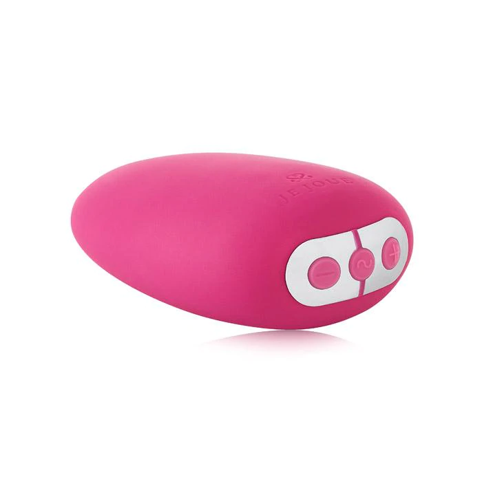 A pink Je Joue Mimi vibrator with silver buttons.