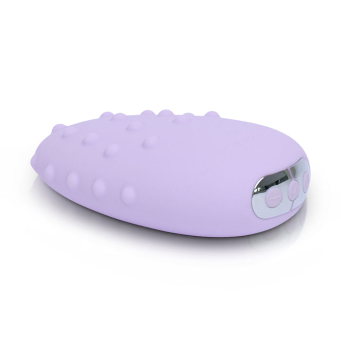A purple clitoral vibrator with raised dots and silver control buttons.
