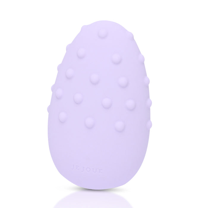 A purple clitoral vibrator with raised dots and the brand name "JE JOUE" embossed on the bottom.