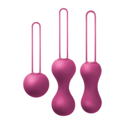 Three fuchsia silicone Kegel balls of varying sizes with retrieval loops.