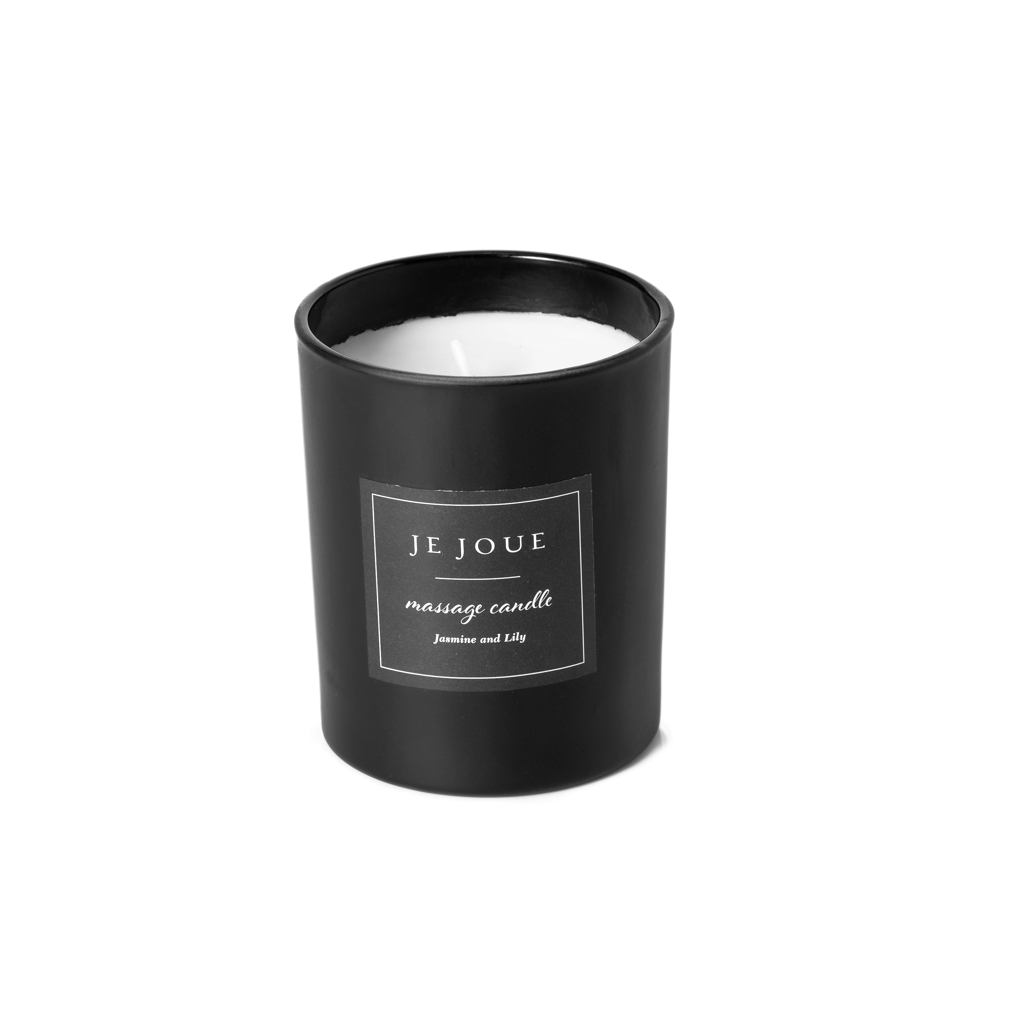 A black massage candle with a label that reads "JE JOUE massage candle Jasmine and Lily".