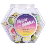 A hexagonal jar filled with 36 assorted flavors of Jelique Nipple Nibblers flavored pleasure balm.