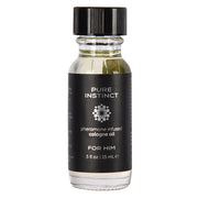 Pure Instinct pheromone infused cologne oil for him in a clear glass bottle.