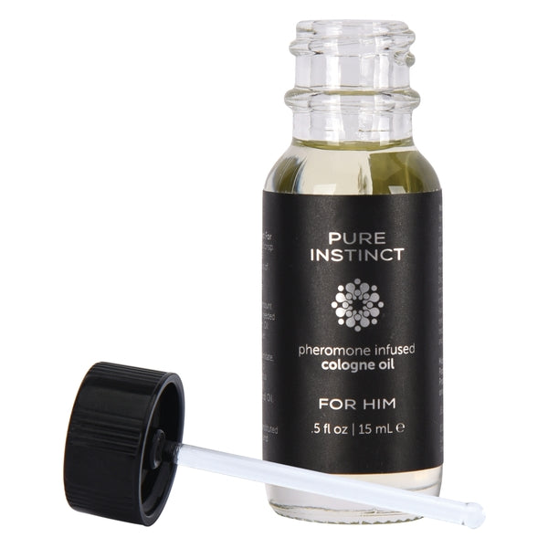 Pure Instinct pheromone infused cologne oil for him in a clear glass bottle with a black cap.