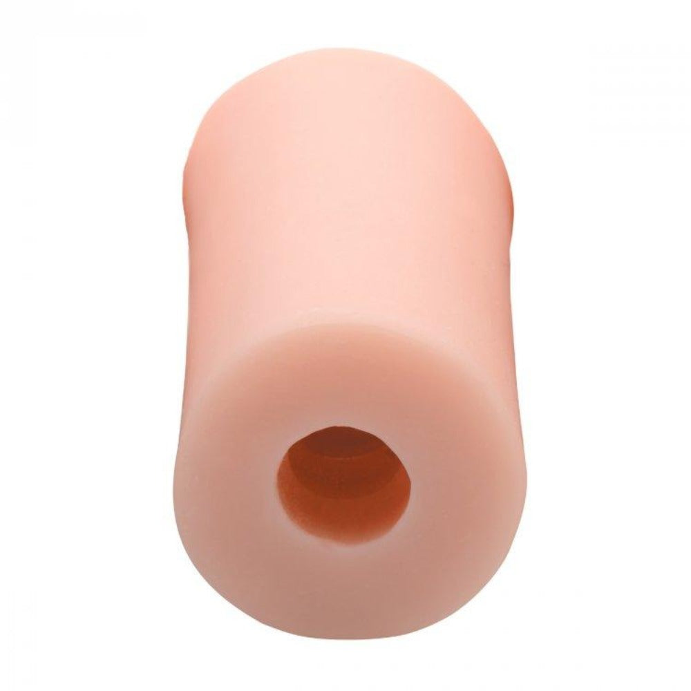 A flesh-colored, textured vulva stroker with an open end.
