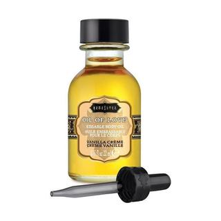 A bottle of Kama Sutra Vanilla Crème Warming Foreplay Oil with a dropper.
