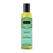 Kama Sutra Soaring Spirit massage oil in a clear bottle with a teal label.